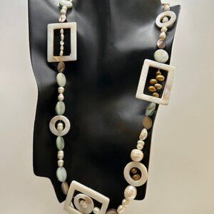 White and Turq Abalone with Mother of Pearl in white and brown.